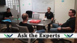 Ask The Experts Picture At Desk